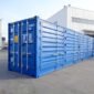 Contenedores de transporte de 40 pies con lateral abierto azul.